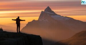 Best motivational quotes about life - sunrise and person climbing a hill